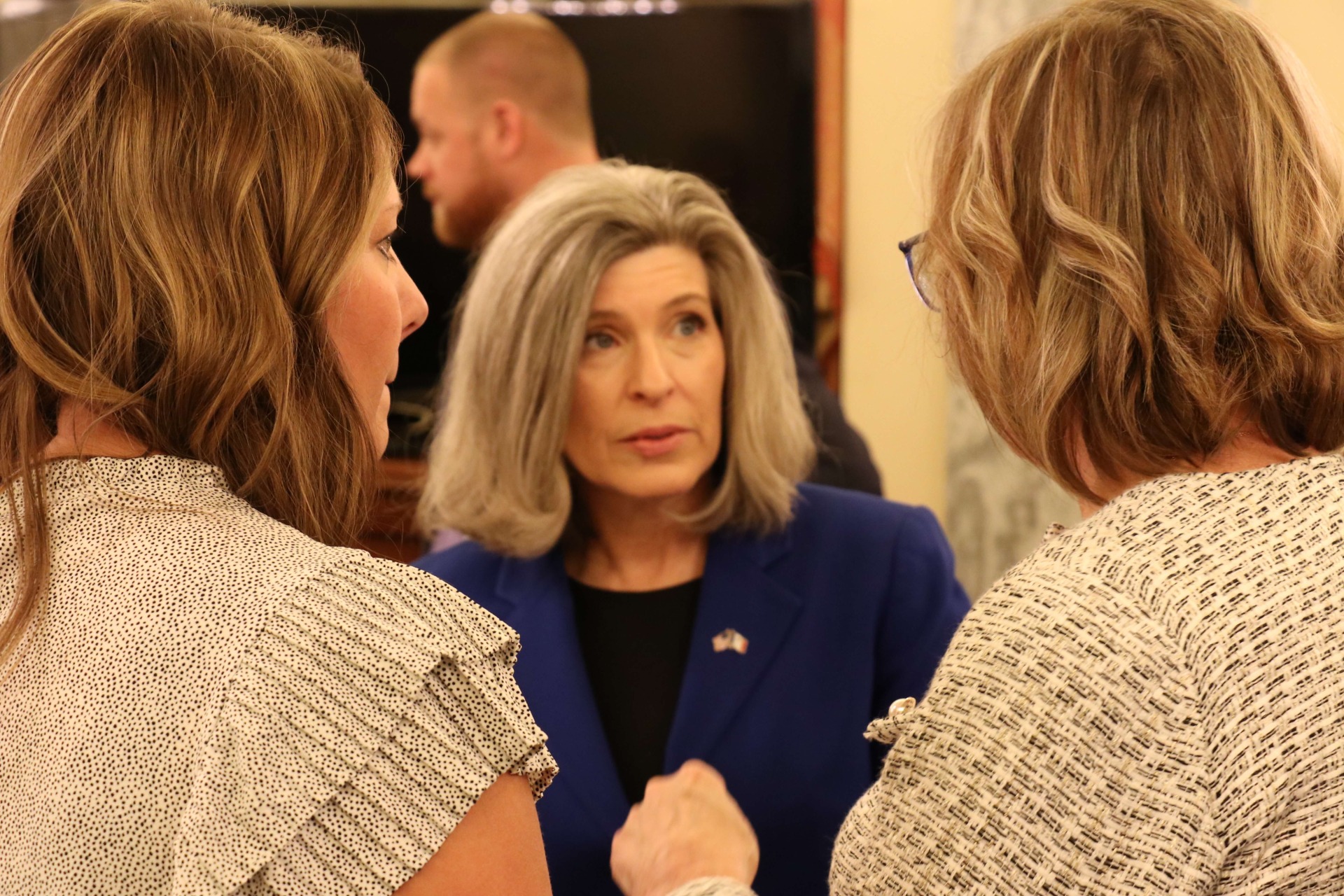 Senator Joni Ernst speaking with Theresa Hildreth.