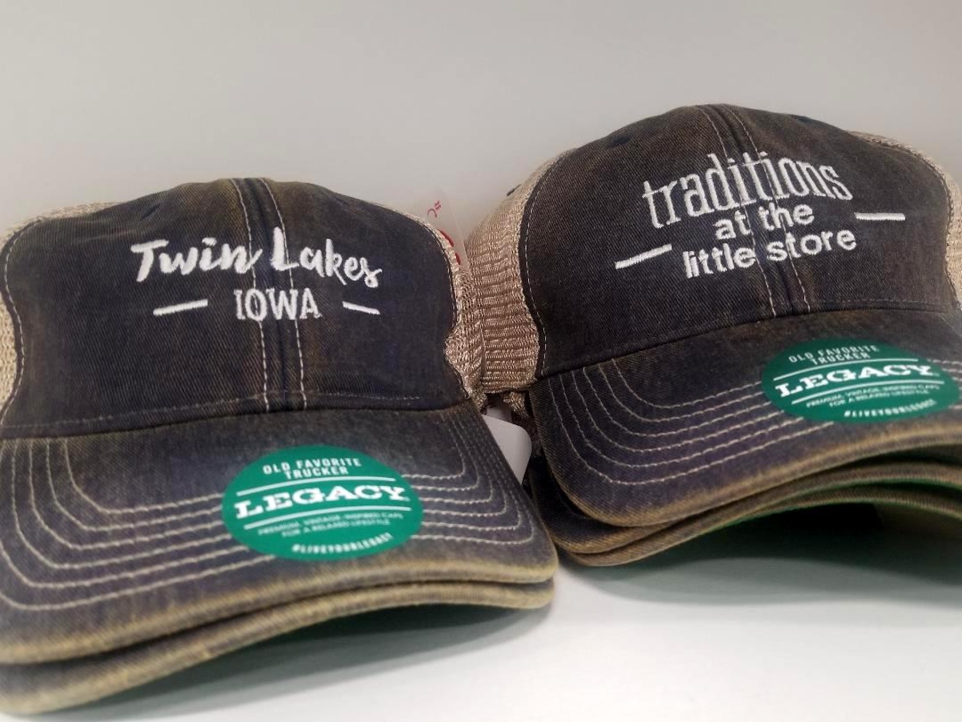 hats and merchandise for sale at Traditions at Twin Lakes 